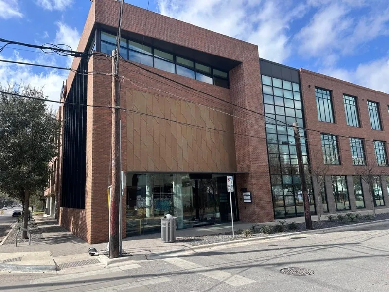 Office building exterior on the corner of 4th & Comal