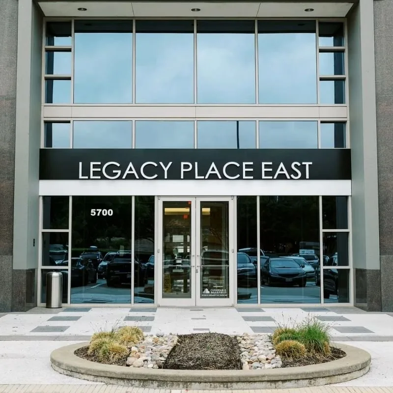 Building exterior at 5700 Tennyson Pkwy, one block east of the Dallas North Tollway